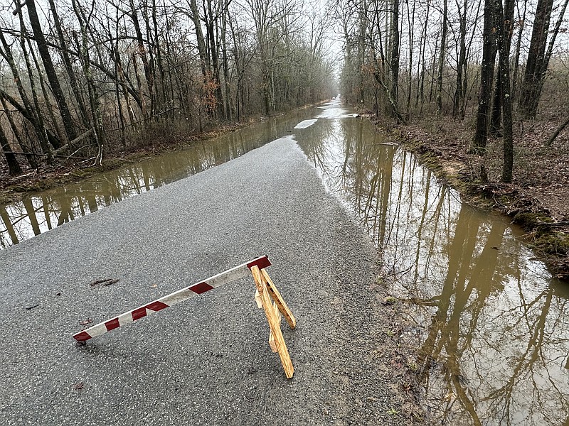 Flood waters cover sections of Szymanski Road in North Little Rock on Wednesday, Jan. 24, 2024.
(Arkansas Democrat-Gazette/Staci Vandagriff)