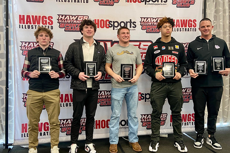 The Hawgs Illustrated Sports Club’s 2023 Prep Football Luncheon recognized six outstanding prep football players and coaches on Wednesday. The honored athletes were from left, Jeff Regan of Rogers, Newcomer of the Year; Carter Nye of Bentonville, the Offensive Player of the Year; Bo Williams of Shiloh Christian, the Jim Lindsey Leadership Award; Kaden Spencer of Fayetteville, the Defensive Player of the Year; and Casey Dick of Fayetteville, the Coach of the Year; Not pictured was Drake Lindsey of Fayetteville, the Player of the Year. Lindsey was an early enrollee at Minnesota and was unable to attend the luncheon.