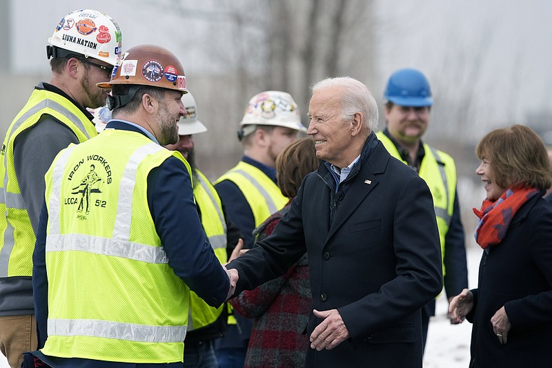 President Joe Biden speaks with iron workers near the John A. Blatnik Bridge between Duluth, Minn., and Superior, Wis., on Thursday in Superior, Wis.
(AP/Alex Brandon)