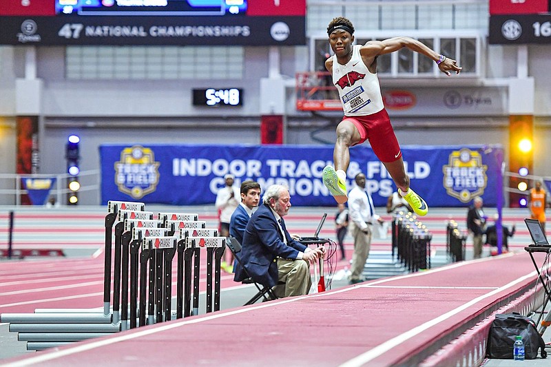 Jaydon Hibbert, shown at the 2023 SEC Indoor Track and Field Championships in Fayetteville, set two collegiate records and won the Bowerman as a freshman at Arkansas. (Hank Layton/NWA Democrat-Gazette)