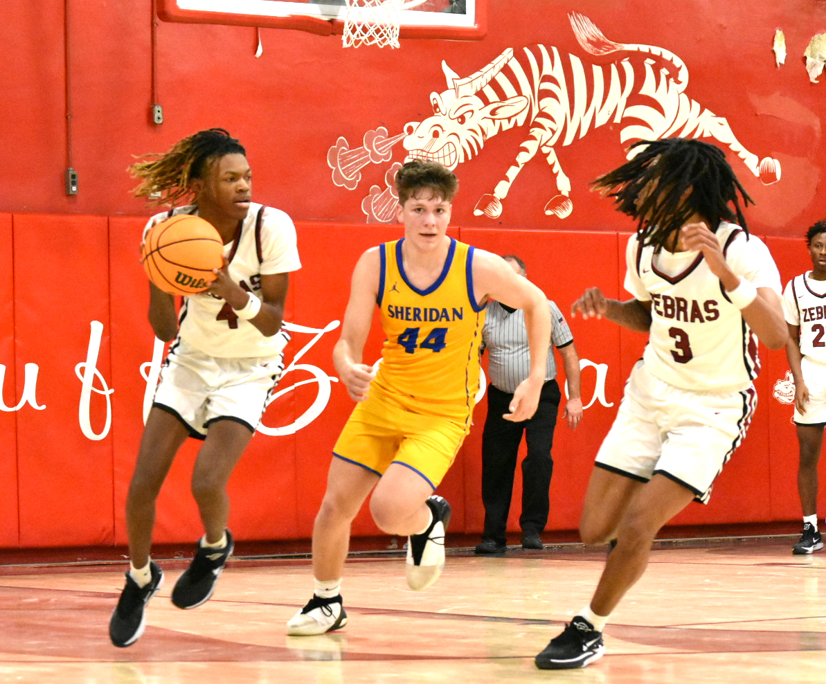 Zebras stifle Yellowjackets, 69-42