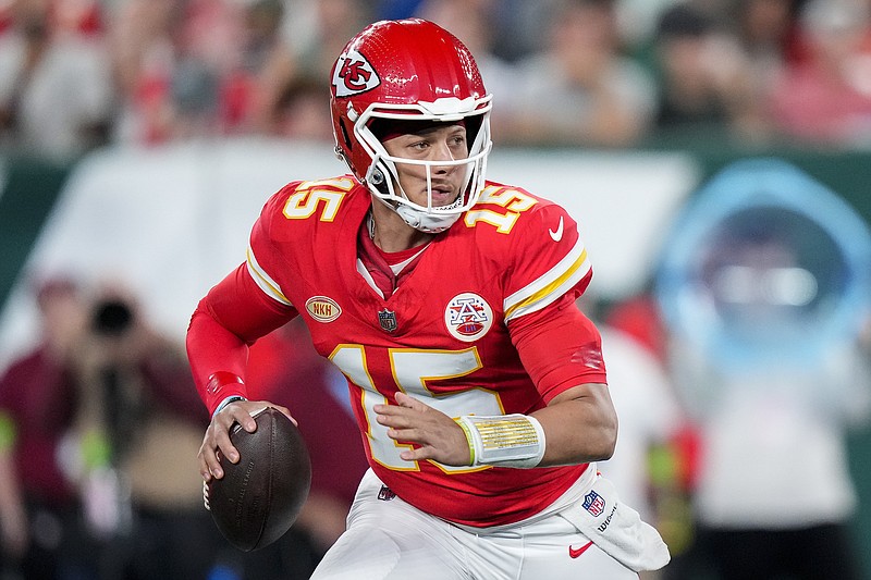 Kansas City Chiefs quarterback Patrick Mahomes (15) looks to pass against the New York Jets during the first quarter of an NFL football game, Sunday, Oct. 1, 2023, in East Rutherford, N.J. (AP Photo/Frank Franklin II)