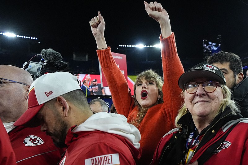 Taylor Swift, left, and Donna Kelce watch the Kansas City Chiefs receive the Lamar Hunt trophey after an AFC Championship NFL football game between the Baltimore Ravens and the Kansas City Chiefs, Sunday, Jan. 28, 2024, in Baltimore. The Kansas City Chiefs won 17-10. (AP Photo/Julio Cortez)