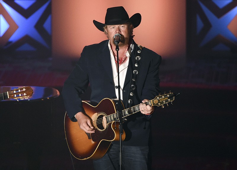 FILE - Honoree Toby Keith performs at the 46th annual Songwriters Hall of Fame Induction and Awards Gala at the Marriott Marquis on June 18, 2015, in New York.“Beer For My Horses” singer-songwriter Toby Keith has died. He was 62.  Keith passed peacefully on Monday, Feb. 5, 2024 surrounded by his family, according to a statement posted on the country singer's website. (Photo by Evan Agostini/Invision/AP, File)