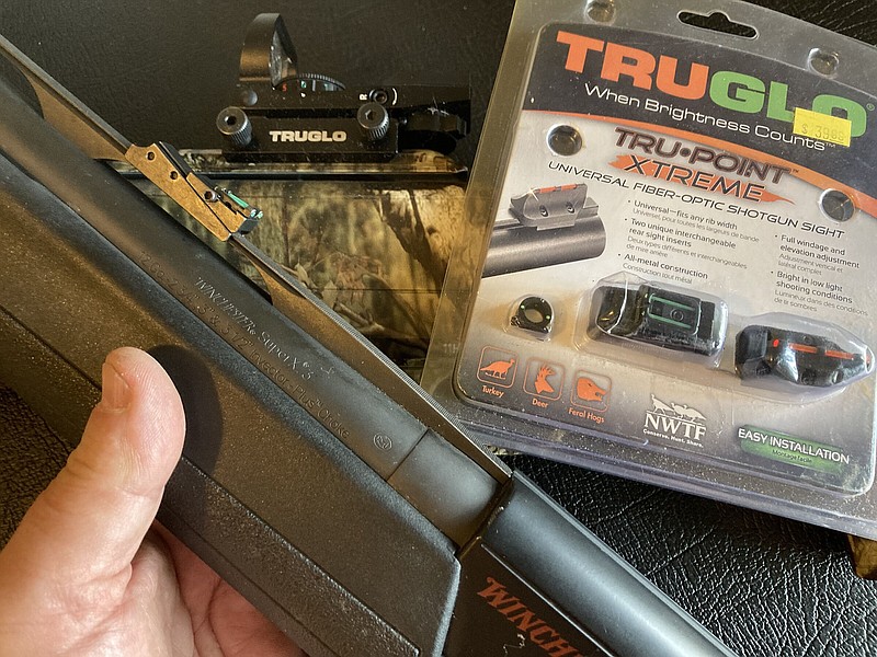 Aftermarket sights greatly improve the efficiency of a turkey hunting shotgun. The author uses passive fiber optic sights and electronic reticle sights.
(Arkansas Democrat-Gazette/Bryan Hendricks)
