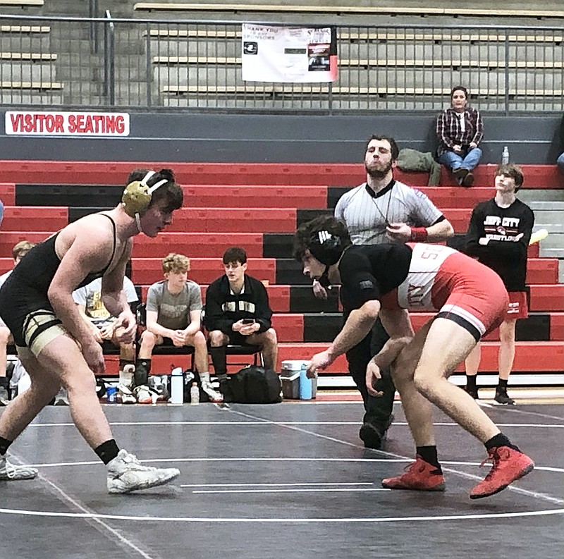 Jefferson City's Anthony Seneker (right) takes on Farmington's Lane Weiss at 157 pounds during a dual Wednesday night at Fleming Fieldhouse. (Trevor Hahn/News Tribune)
