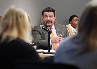 Former state Sen. Jason Rapert speaks to other members of the Arkansas State Library Board during a meeting at the Bessie Moore Conference Room at the Arkansas State Library on Friday, Feb. 9, 2024. (Arkansas Democrat-Gazette/Colin Murphey)