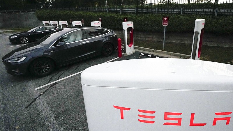 Tesla vehicles charge in September in Woodstock, Ga.
(AP/Mike Stewart)