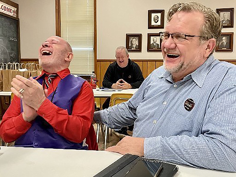 Members of Kingdom Toastmasters laugh as they’re entertained by the club’s Jokemaster during a March 2022 meeting at First Lutheran Church in Little Rock. The organization is having an Evangelism Speak-a-Thon on Feb. 17.
(Arkansas Democrat-Gazette/Frank E. Lockwood)