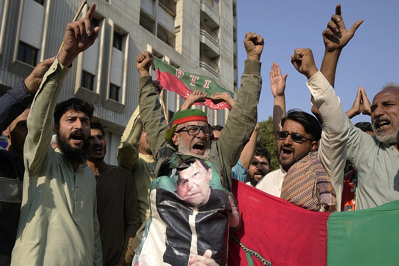 Supporters of Pakistan’s Former Prime Minister Imran Khan’s party ‘Pakistan Tehreek-e-Insaf’ chant slogans during a protest against suspected vote-rigging in some constituencies in the parliamentary elections, in Karachi, Pakistan, on Sunday.
(AP/Fareed Khan)