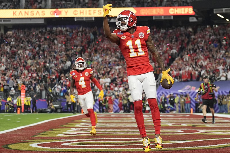Kansas City Chiefs wide receiver Marquez Valdes-Scantling (11) celebrates his touchdown against the San Francisco 49ers during the second half of the NFL Super Bowl 58 football game Sunday, Feb. 11, 2024, in Las Vegas. (AP Photo/Ashley Landis)