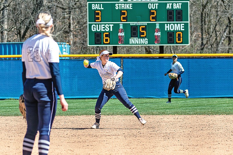 Lincoln’s Leslie Callahan throws the ball to first base for an out during a game last season against Rogers State at Vogel Field. (News Tribune file photo)