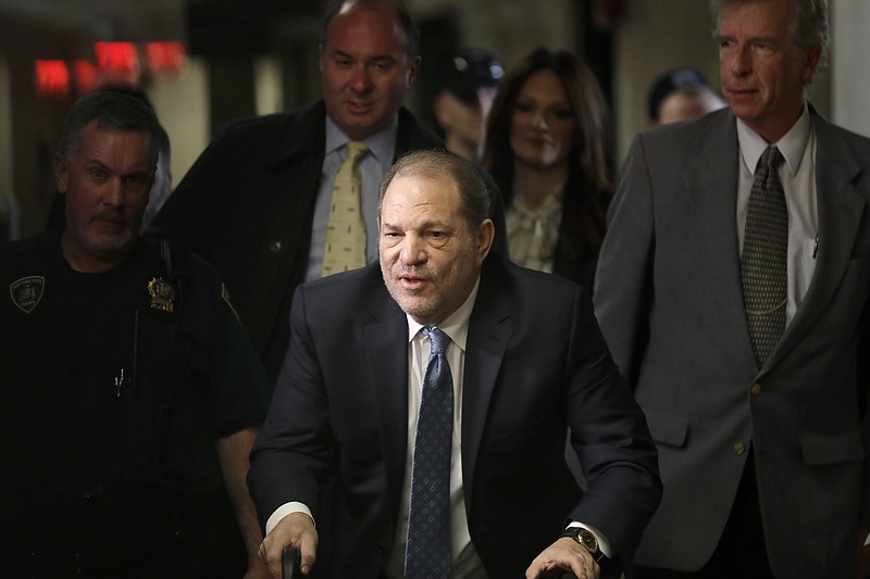 FILE - Harvey Weinstein arrives at a Manhattan courthouse for jury deliberations in his rape trial, Feb. 24, 2020, in New York. Nearly four years after Weinstein was convicted of rape and sent to prison, New York’s highest court will hear arguments Wednesday, Feb. 14, 2024, in his quest to overturn the landmark #MeToo-era verdict.  (AP Photo/Seth Wenig, File)