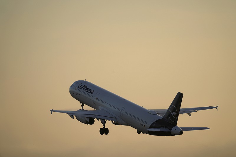 FILE - A Lufthansa Airbus A321 takes off from Lisbon at sunrise, Thursday, Sept. 28, 2023. Airbus says it plans to deliver more aircraft to customers in 2024 even as supply chain headaches continue to afflict the European airplane maker. In its latest annual earnings report, the company reported healthy results for its commercial aircraft business.(AP Photo/Armando Franca, File)
