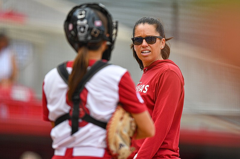 Arkansas Coach Courtney Deifel (right) said she and her team are looking forward to playing the next three weekends at Bogle Park in Fayetteville. “It’s nice to be able to play in front of our fans,” Deifel said. “I think that’s a separator for us, an advantage for us.”
(NWA Democrat-Gazette/Hank Layton)