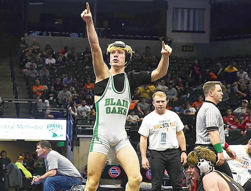 Carter Kempker of Blair Oaks celebrates his win by fall in the 126-pound quarterfinals Wednesday night during the Class 2 boys wrestling state championships at Mizzou Arena in Columbia. (Cleo Norman/News Tribune)