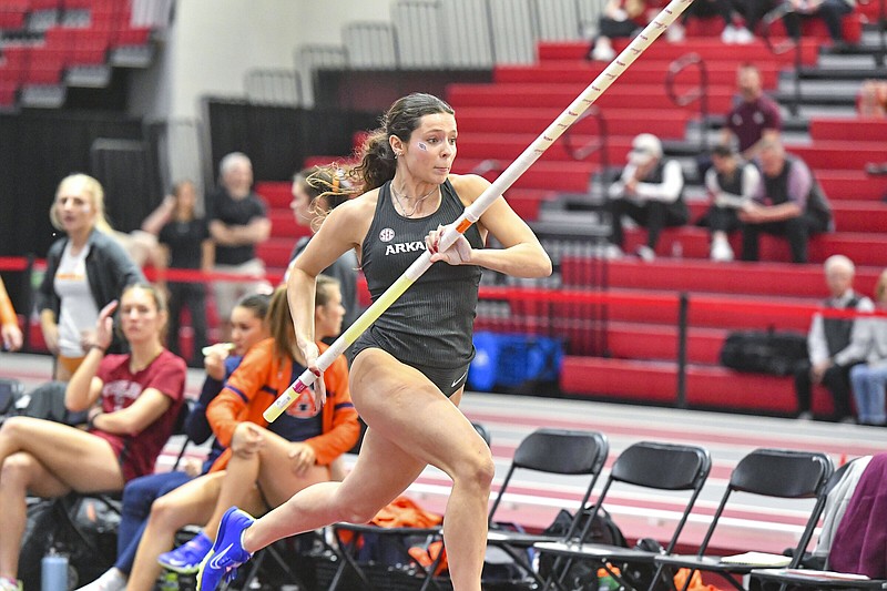 Hannah Estes of Arkansas competes in the women’s pole vault Friday during the first day of the 2024 SEC Indoor Track and Field Championships in Fayetteville.
(NWA Democrat-Gazette/Hank Layton)