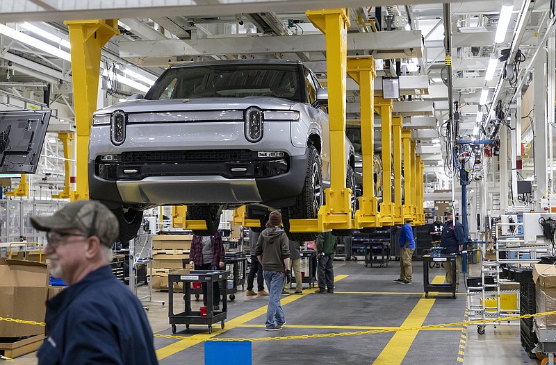 Rivian laying off 10 of salaried workforce as EV demand slows