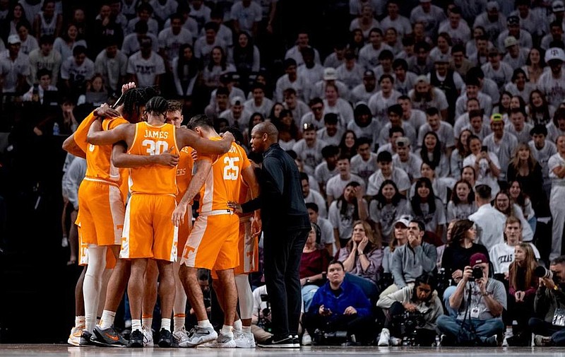 Tennessee Athletics photo / Tennessee players huddle during their 85-69 loss at Texas A&M on Feb. 10. The No. 5 Volunteers and the Aggies meet again Saturday night inside the Food City Center.