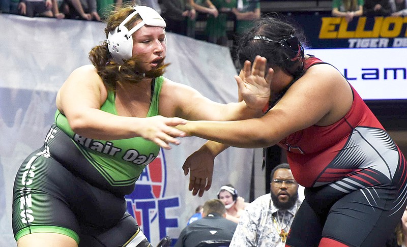 Loghan Sumner of Blair Oaks takes on Marshall's Sheryl Solano in their third-place match at 235 pounds Thursday during the Class 1 girls wrestling state championships at Mizzou Arena in Columbia. (Cleo Norman/News Tribune)
