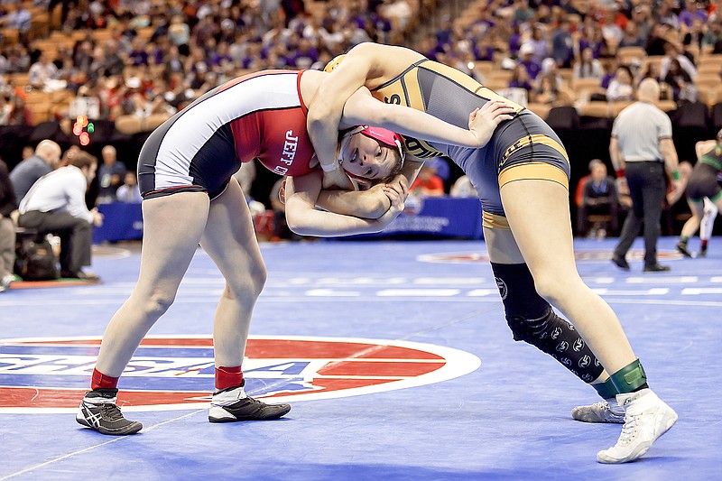 Jefferson City’s Lexi Dunwiddie wrestles Cassville’s Faith James in their Class 1 girls championship match at 130 pounds last year at Mizzou Arena in Columbia. (News Tribune file photo)