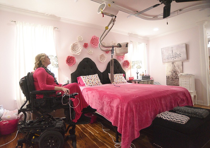 Staff photo by Matt Hamilton/ Bliss Welch talks about the lift over her bed at her home on Thursday, February 22, 2024.