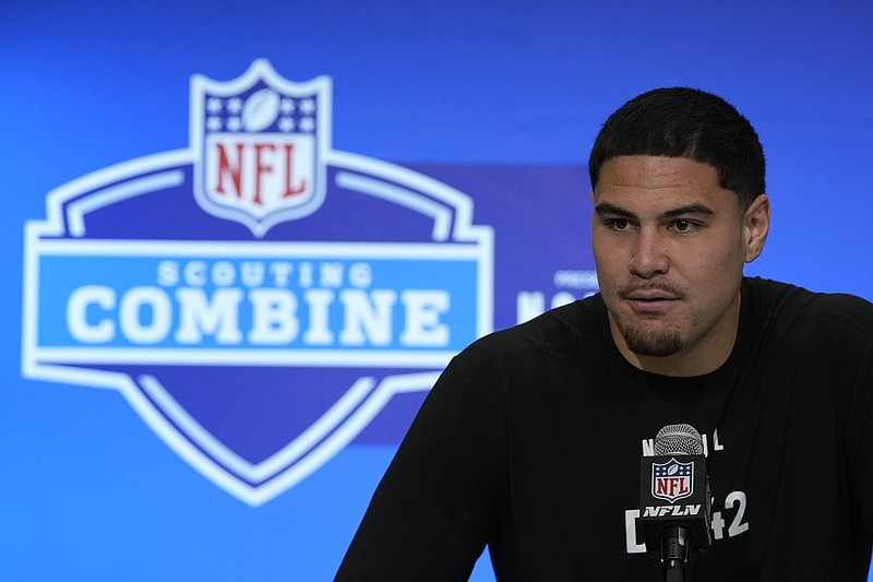 UCLA defensive lineman Laiatu Latu speaks during a news conference at the NFL football scouting combine, Wednesday, Feb. 28, 2024, in Indianapolis. (AP Photo/Darron Cummings)