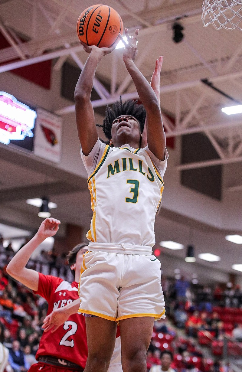Mills junior Zaylin Rowland goes up for a layup during the Comets’ 73-59 victory over Jonesboro Westside on Thursday in Farmington. Rowland finished with 12 points as the Comets advanced to a semifinal game Saturday.
(Special to NWA Democrat-Gazette/Brent Soule)