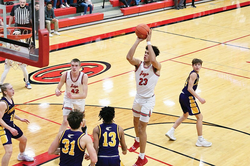 Jordan Martin of Jefferson City puts up a shot in the lane during Thursday night’s first-round game in the Class 5 District 5 Tournament against Camdenton at Fleming Fieldhouse. (Alexa Pfeiffer/News Tribune)