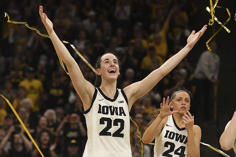 Iowa guard Caitlin Clark (22) celebrates during Senior Day ceremonies following a victory over Ohio State in an NCAA college basketball game, Sunday, March 3, 2024, in Iowa City, Iowa. (AP Photo/Cliff Jette)