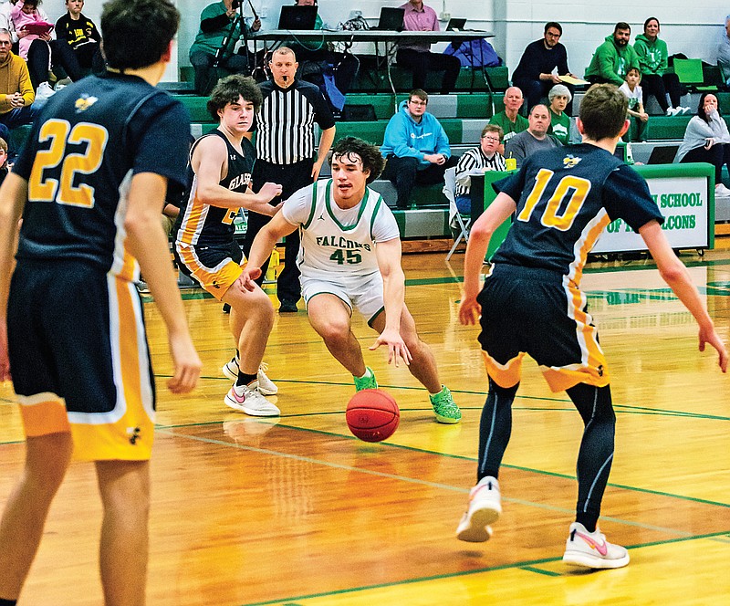 Ryan Glavin of Blair Oaks charges the lane through the Glasgow defense during a game earlier this season at Blair Oaks Middle School in Wardsville. (Ken Barnes/News Tribune)