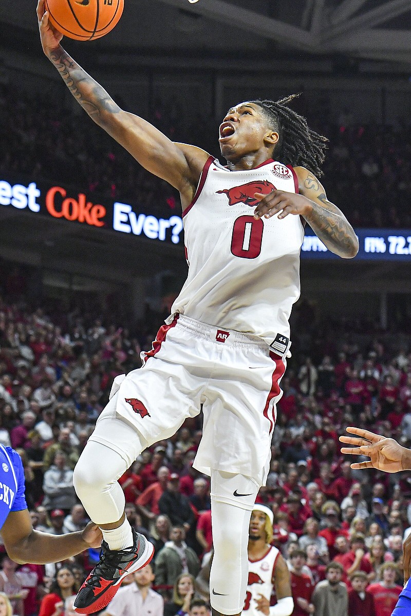 Arkansas guard Khalif Battle (0) shoots a layup, Saturday, Jan. 27, 2024, during the second half of the Kentucky Wildcats’ 63-57 win over the Razorbacks at Bud Walton Arena in Fayetteville. Visit nwaonline.com/photo for today’s photo gallery..(NWA Democrat-Gazette/Hank Layton)