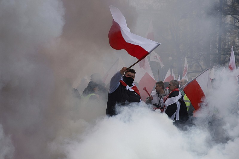 Polish farmers, hunters and their supporters hold a protest in Warsaw, Poland, on Wednesday.
(AP/Michal Dyjuk)