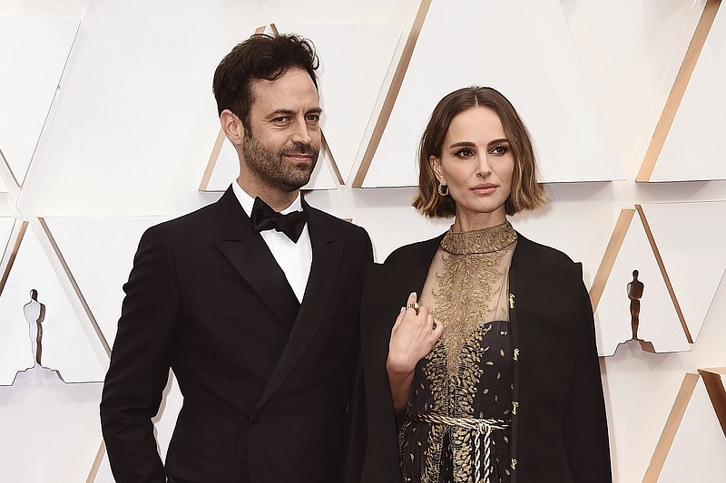 Benjamin Millepied, left, and Natalie Portman appear at the Oscars in Los Angeles on Feb. 9, 2020. Portman and Millepied have divorced after 11 years of marriage and two children. The Oscar-winning actor and Millepied, a choreographer and director, finalized the divorce last month in France. (Photo by Jordan Strauss/Invision/AP, File)