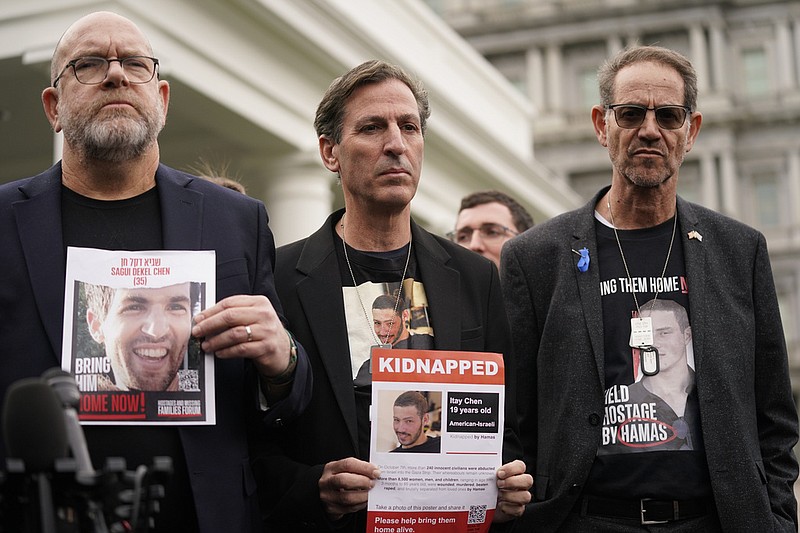 Jonathan Dekel-Chen (from left), father of Sagui Dekel-Chen; Ruby Chen, father of Itay Chen; and Ronen Neutra, father of Omer Neutra, speak to reporters in front of the White House in Washington in this Dec. 13, 2023 file photo. They joined other families of Americans taken hostage by Hamas during the Oct. 7, 2023 attacks in Israel. (AP/Evan Vucci)