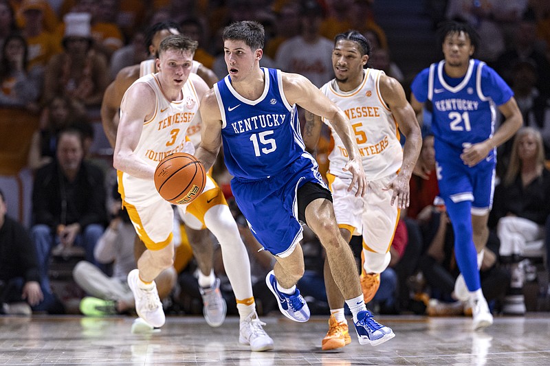 Kentucky guard Reed Sheppard (15) dribbles upcourt during the second half of an NCAA college basketball game against Tennessee, Saturday, March 9, 2024, in Knoxville, Tenn. (AP Photo/Wade Payne)