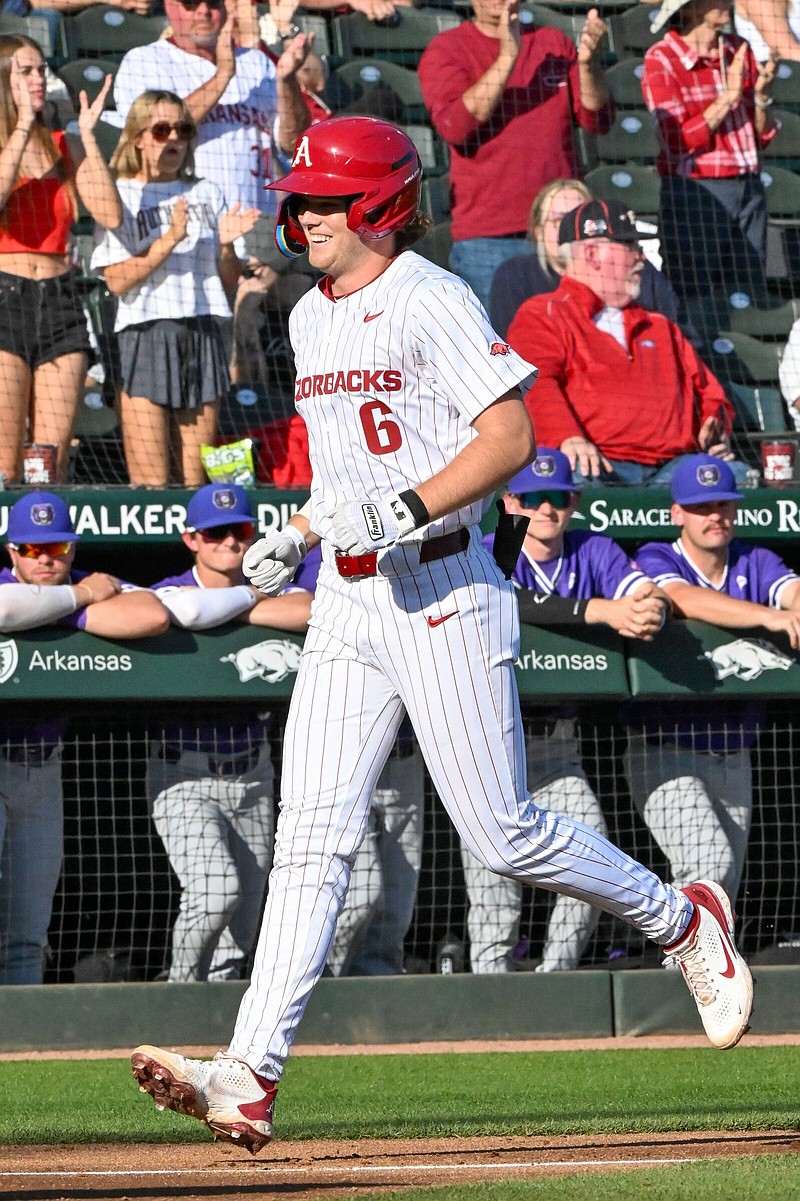 Arkansas’ Ben McLaughlin rounds the bases after hitting a three run homer in the third inning during Arkansas’ 9-7 win over University of Central Arkansas on Tuesday, Mar. 5, 2024, at Baum-Walker Stadium in Fayetteville. Visit nwaonline.com/photo for today's photo gallery. (NWA Democrat Gazette/Caleb Grieger)