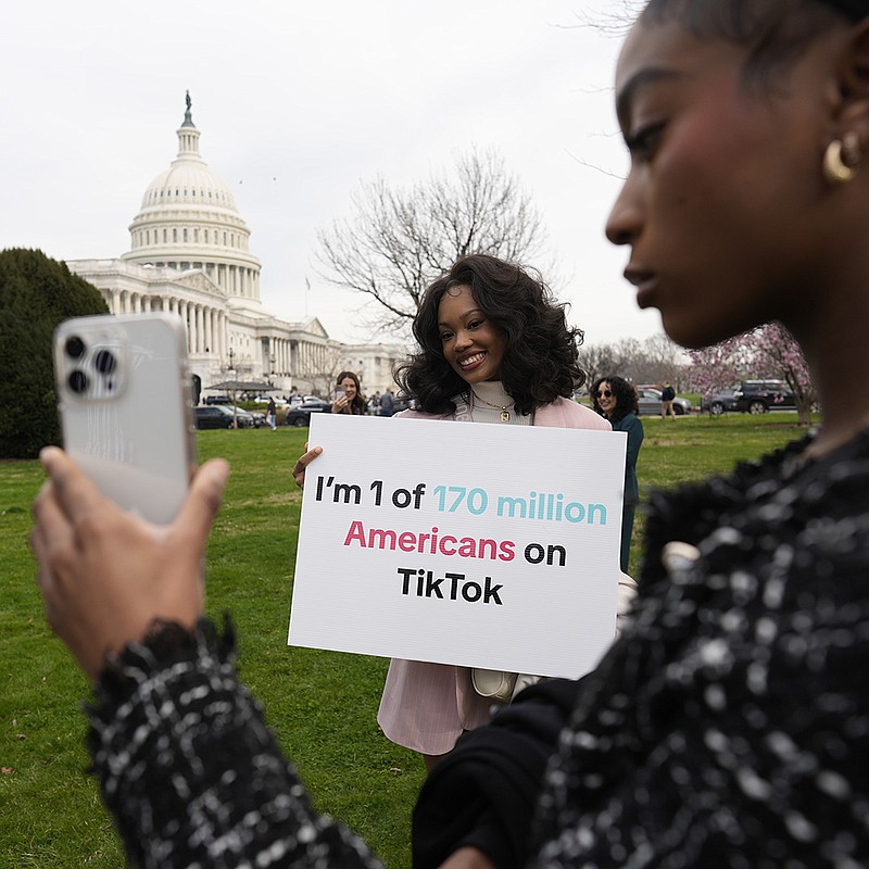 Devotees of TikTok gather at the U.S. Capitol on Tuesday, as the House passed a bill that would lead to a nationwide ban of the popular video app if its China-based owner doesn’t sell.
(AP/J. Scott Applewhite)