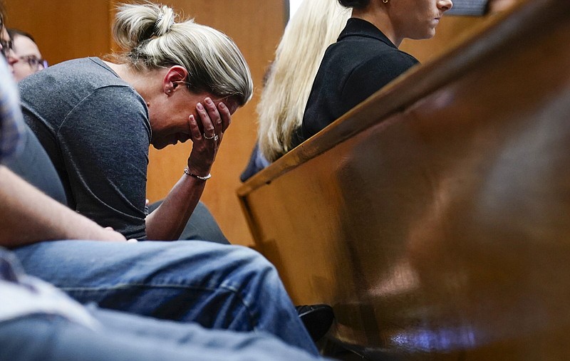 Nicole Beausoleil, mother of Madisyn Baldwin, who was killed in a mass shooting at Oxford High School in 2021, becomes emotional as Oakland County Prosecutor Karen McDonald makes closing statements that include autopsy reports in the trial against James Crumbley on Wednesday in Pontiac, Mich.
(AP/Detroit Free Press/Mandi Wright)