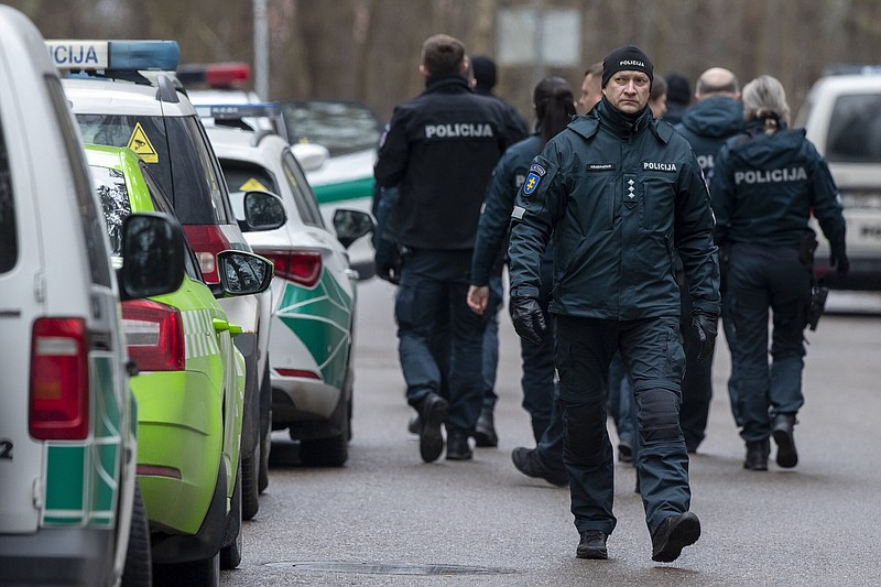 Police officers patrol near the house of Leonid Volkov, a close associate of the late Russian opposition leader Alexei Navalny, in Vilnius, Lithuania, on Wednesday.
(AP/Mindaugas Kulbis)