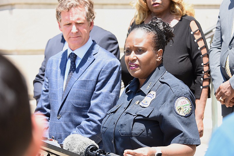 Staff photo by Matt Hamilton / Mayor Tim Kelly looks on as Police Chief Celeste Murphy speaks to members of the media during a news conference on the steps of Chattanooga City Hall in 2022.