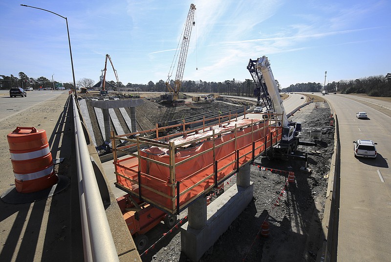 Traffic moves through a construction zone in Little Rock at Cantrell Road and Interstate 430 in the this February 2021 file photo. (Arkansas Democrat-Gazette/Staton Breidenthal).
