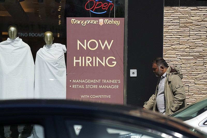 A hiring sign is displayed at a retail store in Chicago on Monday.
(AP/Nam Y. Huh)