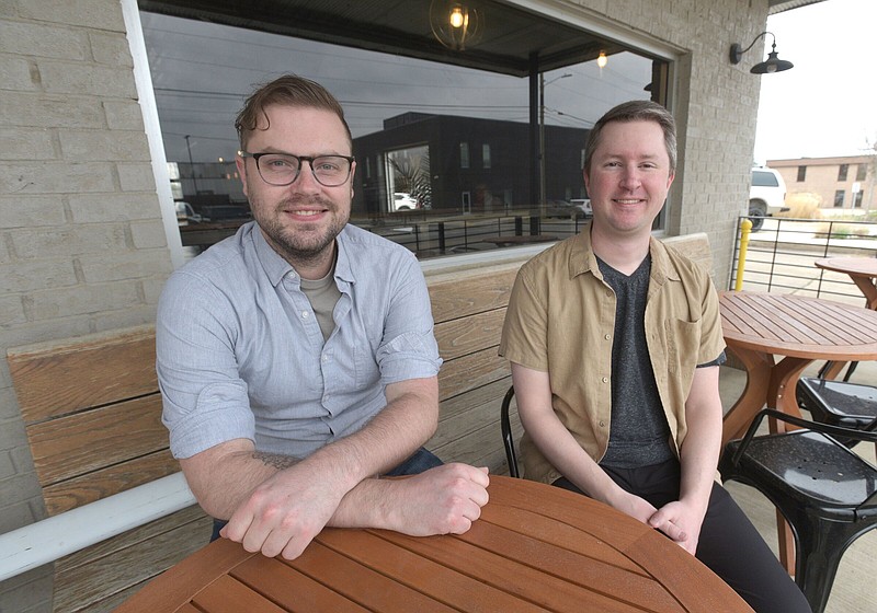 Kjartan Kennedy (left) and Greg Rogers teamed up to create the computer game The Haunting of Joni Evers, to be released soon by Causeway Studios.
(NWA Democrat-Gazette/Flip Putthoff)