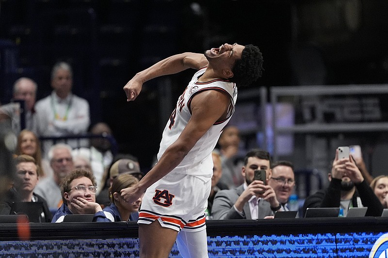 Auburn center Dylan Cardwell (44) reacts after scoring during the second half of the Tigers’ 73-66 victory over Mississippi State in the semifinal round of the SEC tournament Saturday in Nashville, Tenn.
(AP/John Bazemore)