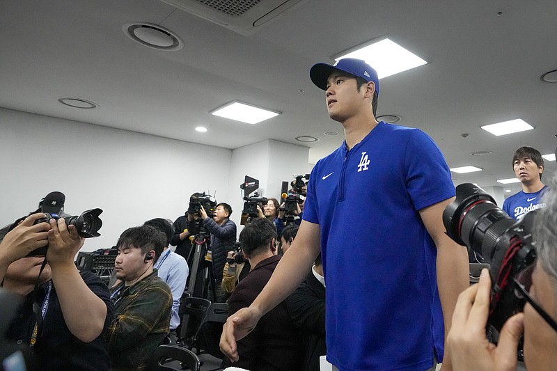 Shohei Ohtani of the Los Angeles Dodgers arrives to a news conference Saturday before the team’s workout at the Gecheck Sky Dome in Seoul, South Korea. The Dodgers will open the season with two games against the San Diego Padres in Seoul on Wednesday and Thursday.
(AP/Lee Jin-man)