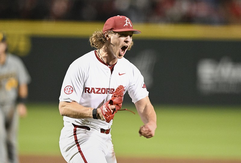 Arkansas Hagen Smith (33) reacts, Friday, March 15, 2024 during the sixth inning of a baseball game at Baum-Walker Stadium in Fayetteville. Visit nwaonline.com/photos for today's photo gallery...(NWA Democrat-Gazette/Charlie Kaijo)