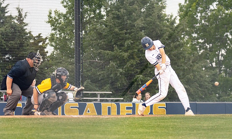 Kase Winegar of Helias starts his swing during last season’s game against Sedalia Smith-Cotton at the American Legion Post 5 Sports Complex. (News Tribune file photo)
