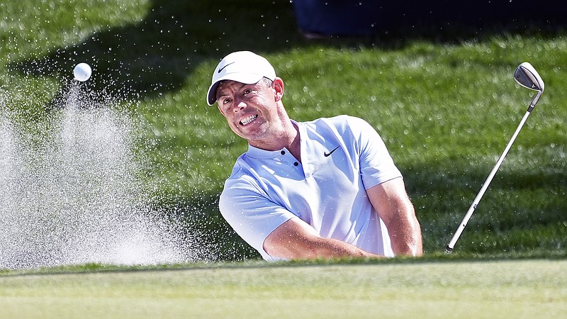 Rory McIlroy blasts from the sand trap on the sixth hole during Friday's second round of The Players Championship in Ponte Vedra Beach, Fla. (Associated Press)