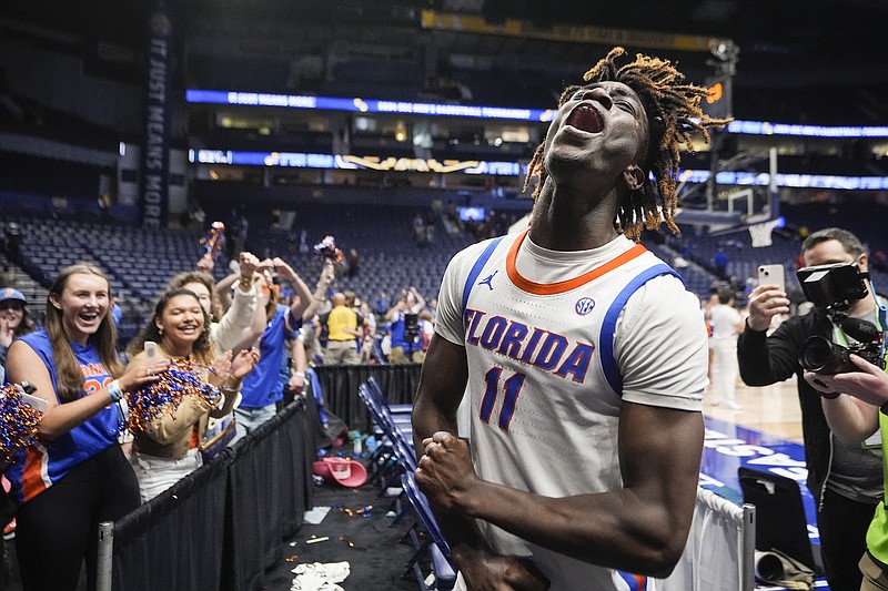 AP photo by John Bazemore / Florida guard Denzel Aberdeen celebrates as he leaves the court after the Gators beat Texas A&M in an SEC tournament semifinal Saturday at Bridgestone Arena in Nashville.